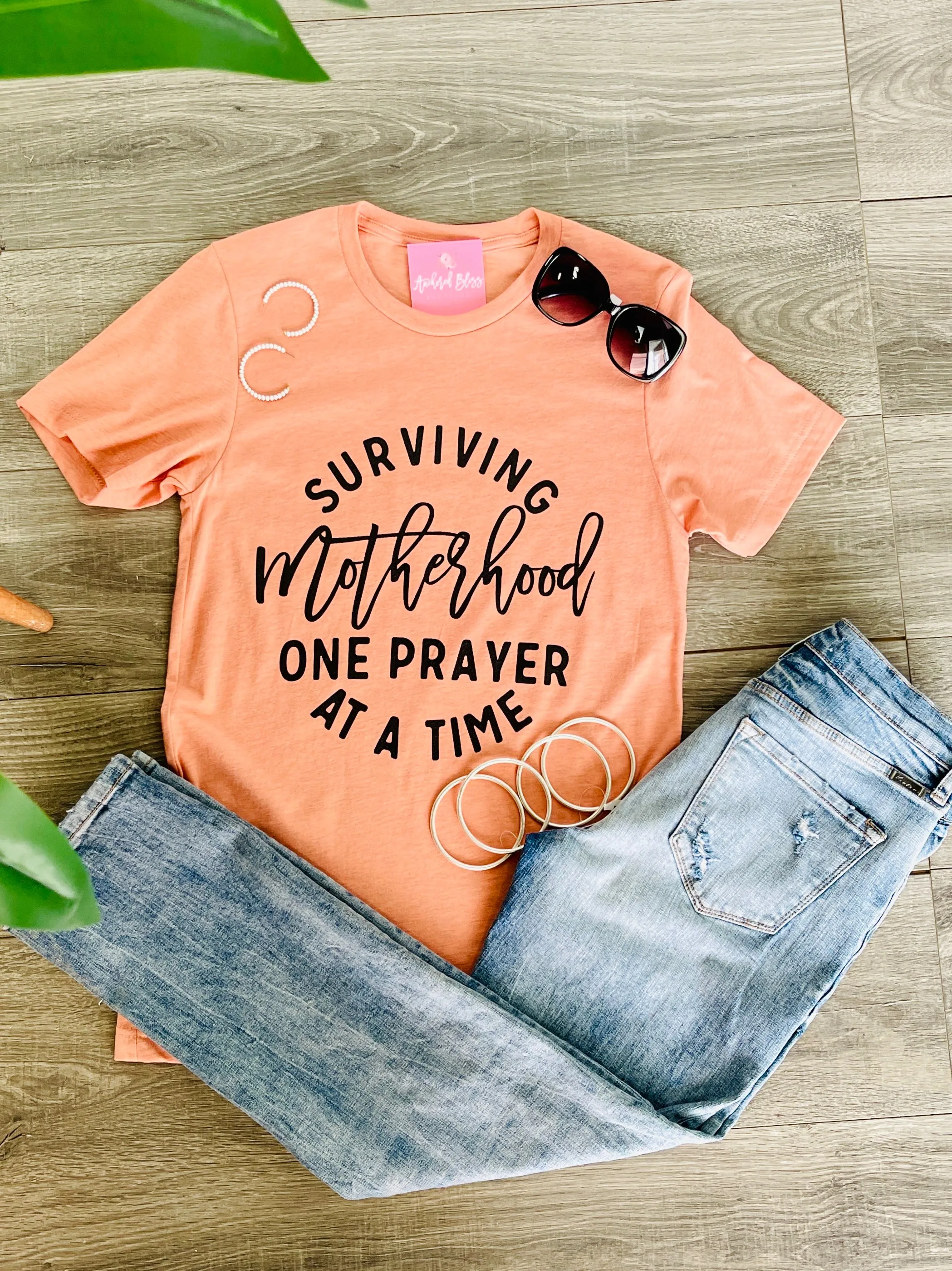 Surviving Motherhood One Prayer at a Time Graphic Tee